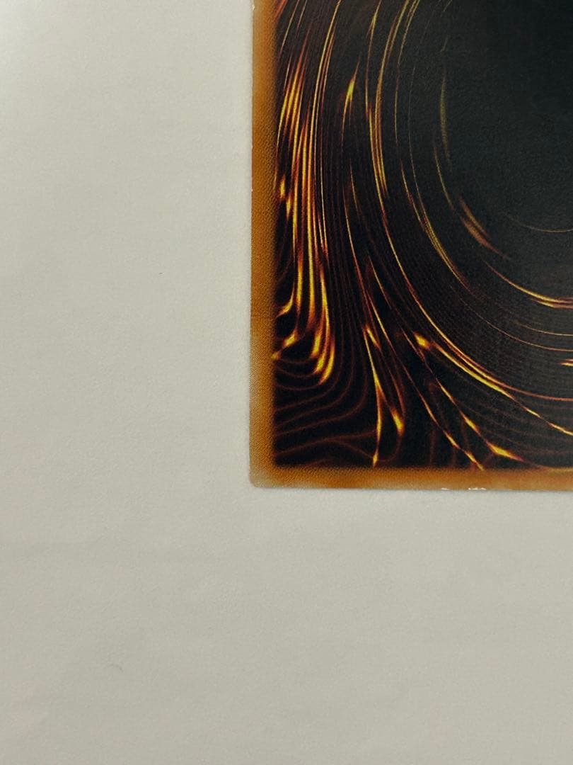 Antique Gear Golem Ultimate Rare Yu-Gi-Oh! card with worn edges and visible horizontal line on back