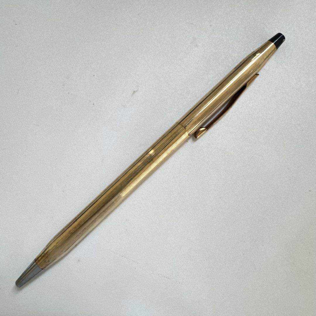 Vintage Cross Classic Century ballpoint pen with 10 karat gold plating on a white background