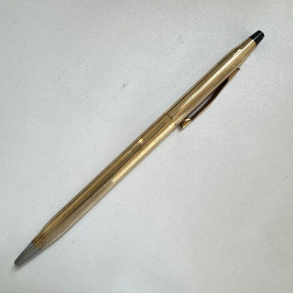 Vintage Cross Classic Century ballpoint pen with 10 karat gold plating on a white background