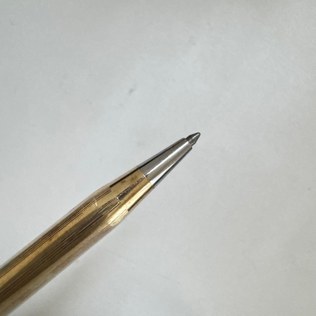 Vintage Cross Classic Century ballpoint pen with 10 karat gold plating on a white background