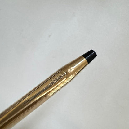Vintage Cross Classic Century ballpoint pen with 10 karat gold plating on a white background