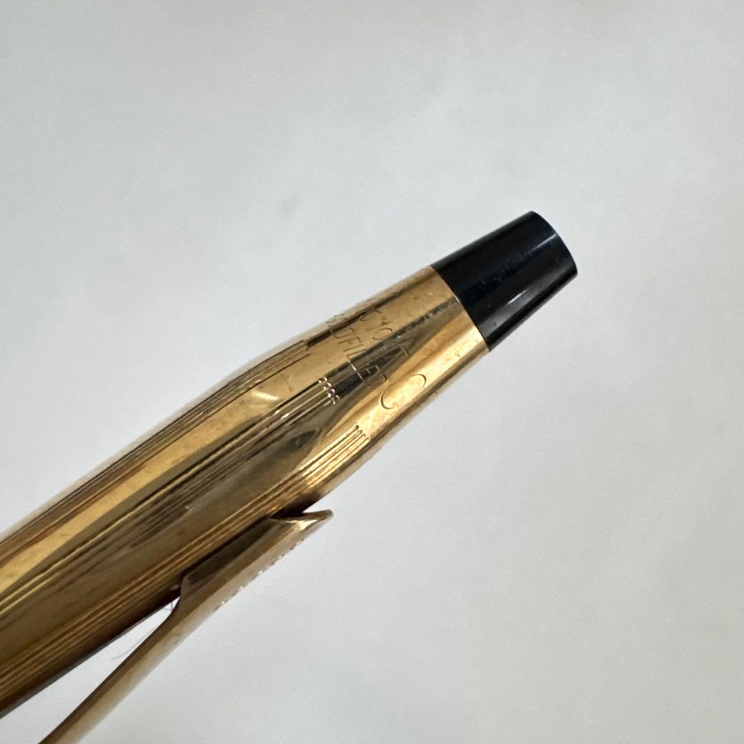Vintage Cross Classic Century ballpoint pen with 10 karat gold plating on a white background