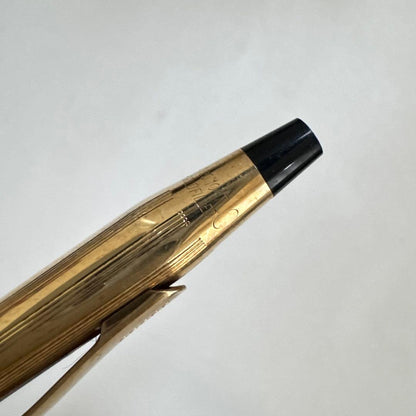 Vintage Cross Classic Century ballpoint pen with 10 karat gold plating on a white background