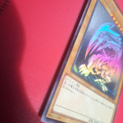 Yugioh Blue-Eyes White Dragon 20AP holographic rare card with minor scratches from Japan import