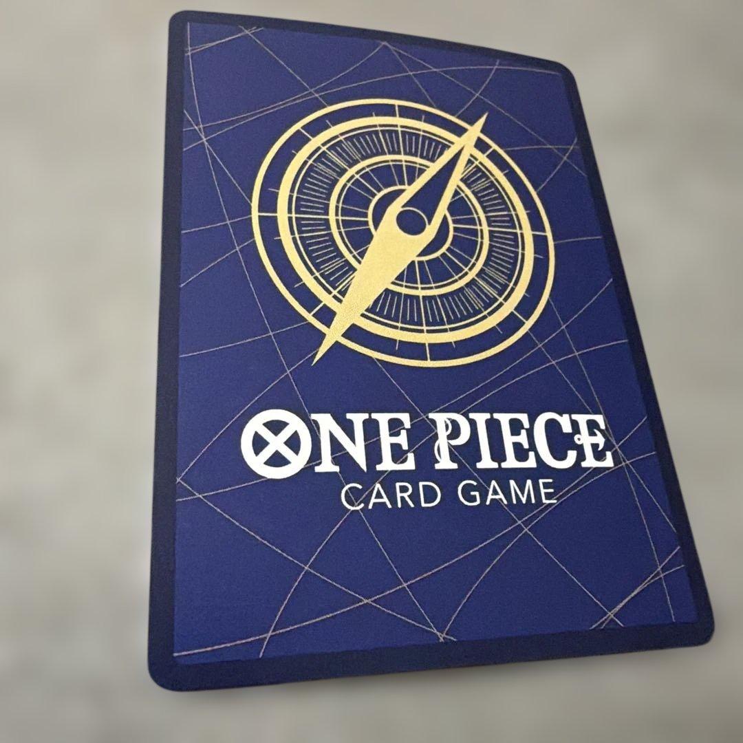 One Piece Card from the Romance Dawn series featuring original artwork with slight rubs and scratches