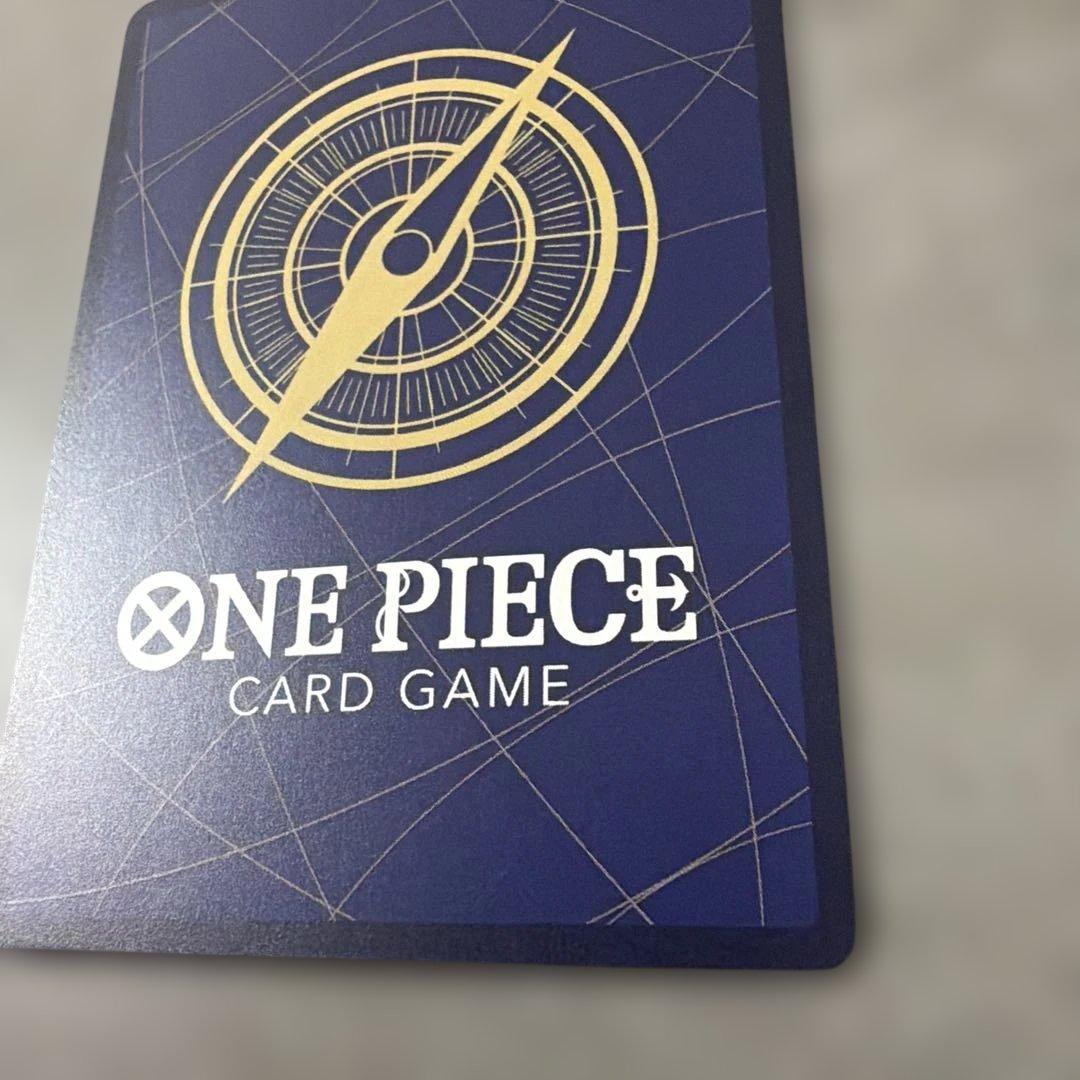 One Piece Card from the Romance Dawn series featuring original artwork with slight rubs and scratches