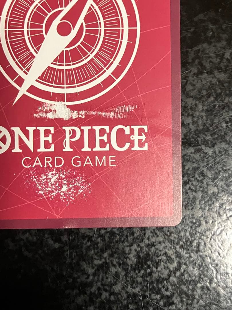 Nami L Leader Parallel OP03-040 One Piece card with visible scratches and damage, Japan import