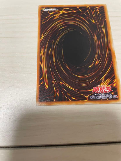 Used Yu-Gi-Oh Nephthys the Phoenix God Ultimate Rare Pleafer Card in screw-down holder with visible scratches and dirt