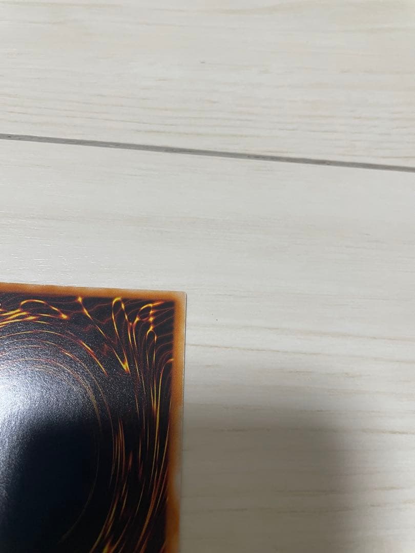 Used Yu-Gi-Oh Nephthys the Phoenix God Ultimate Rare Pleafer Card in screw-down holder with visible scratches and dirt