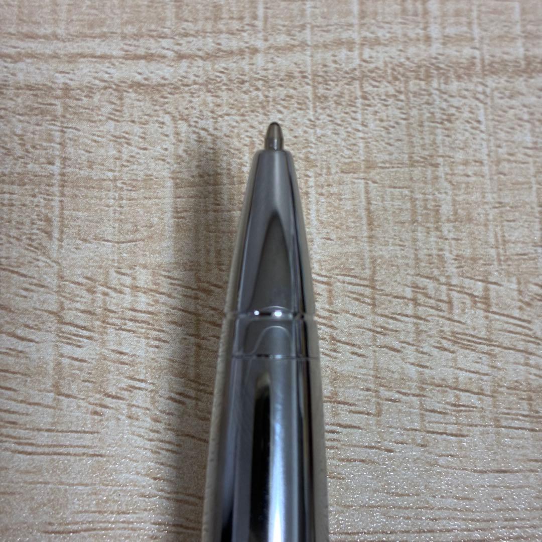 Cross brand silver ballpoint pen with matching case displayed on white background