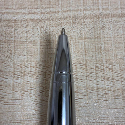 Cross brand silver ballpoint pen with matching case displayed on white background
