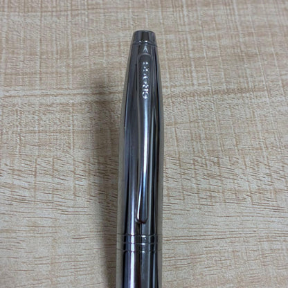 Cross brand silver ballpoint pen with matching case displayed on white background