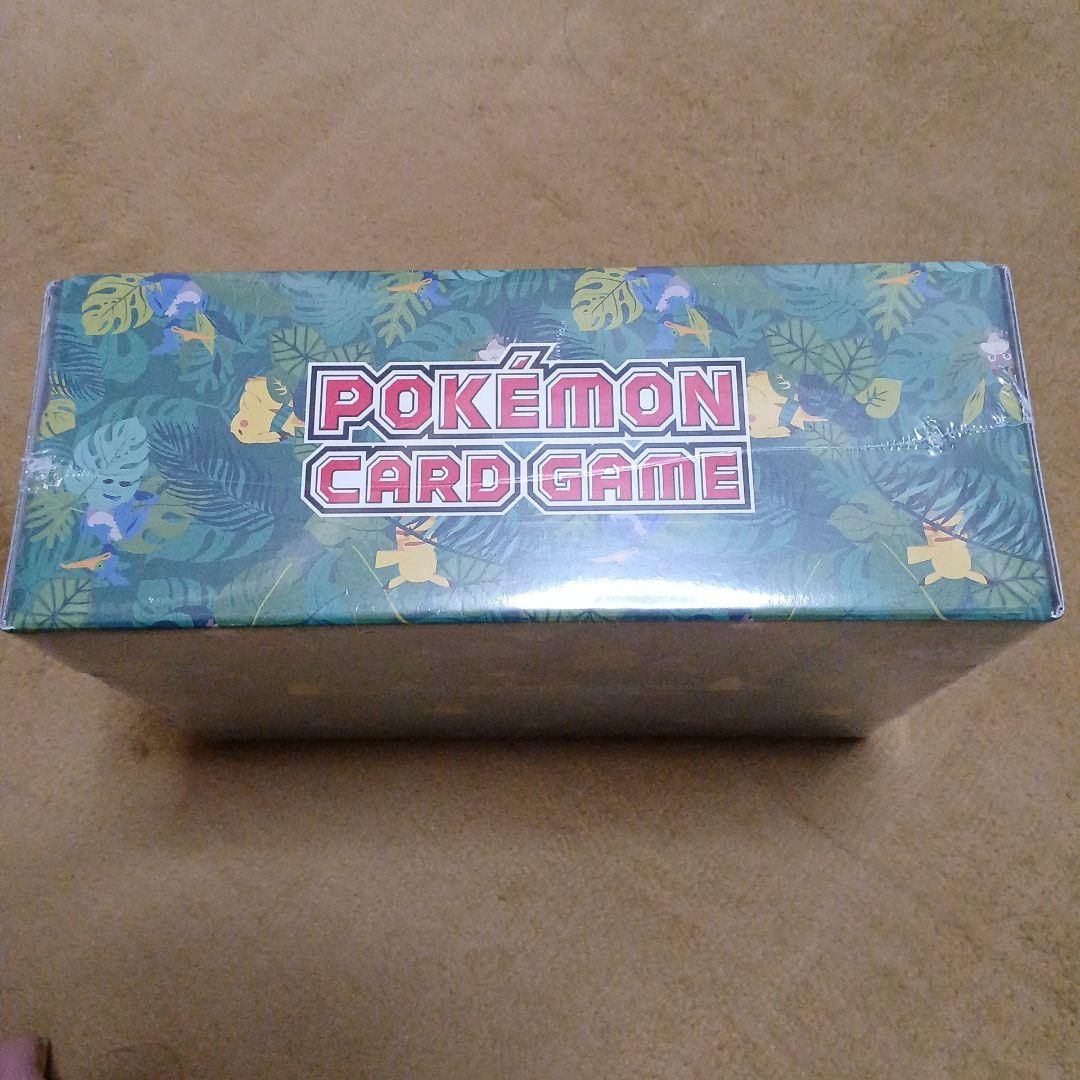 Pokemon Secrebii and Zarude Forest Set with promo cards, coins, booster packs, and serial code ticket