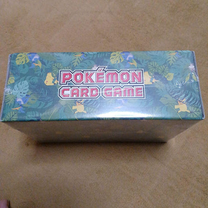 Pokemon Secrebii and Zarude Forest Set with promo cards, coins, booster packs, and serial code ticket