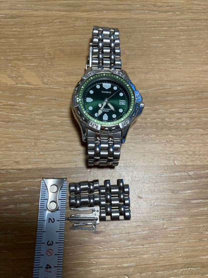 Casio Green Dial Quartz Watch with 100m Water Resistance