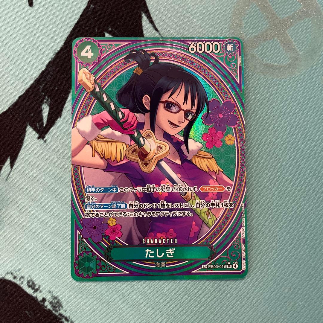 One Piece Tashigi SP EB03-018 collectible card displayed in protective sleeve