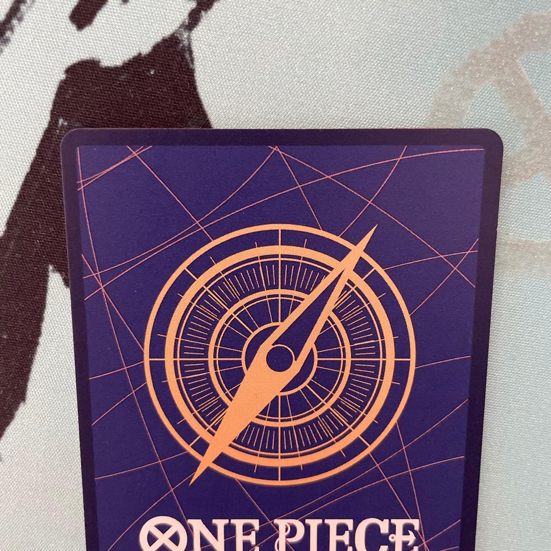 One Piece Tashigi SP EB03-018 collectible card displayed in protective sleeve