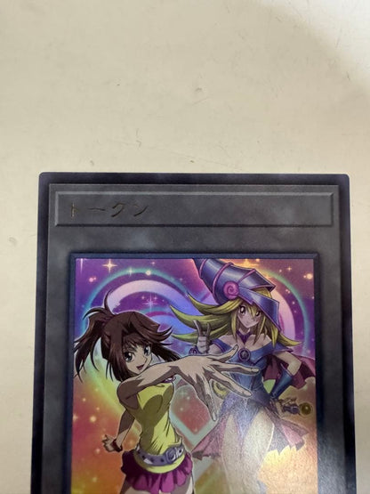 Yu-Gi-Oh Ultra Rare Black Magician Girl TK05-JP008 trading card in protective sleeve