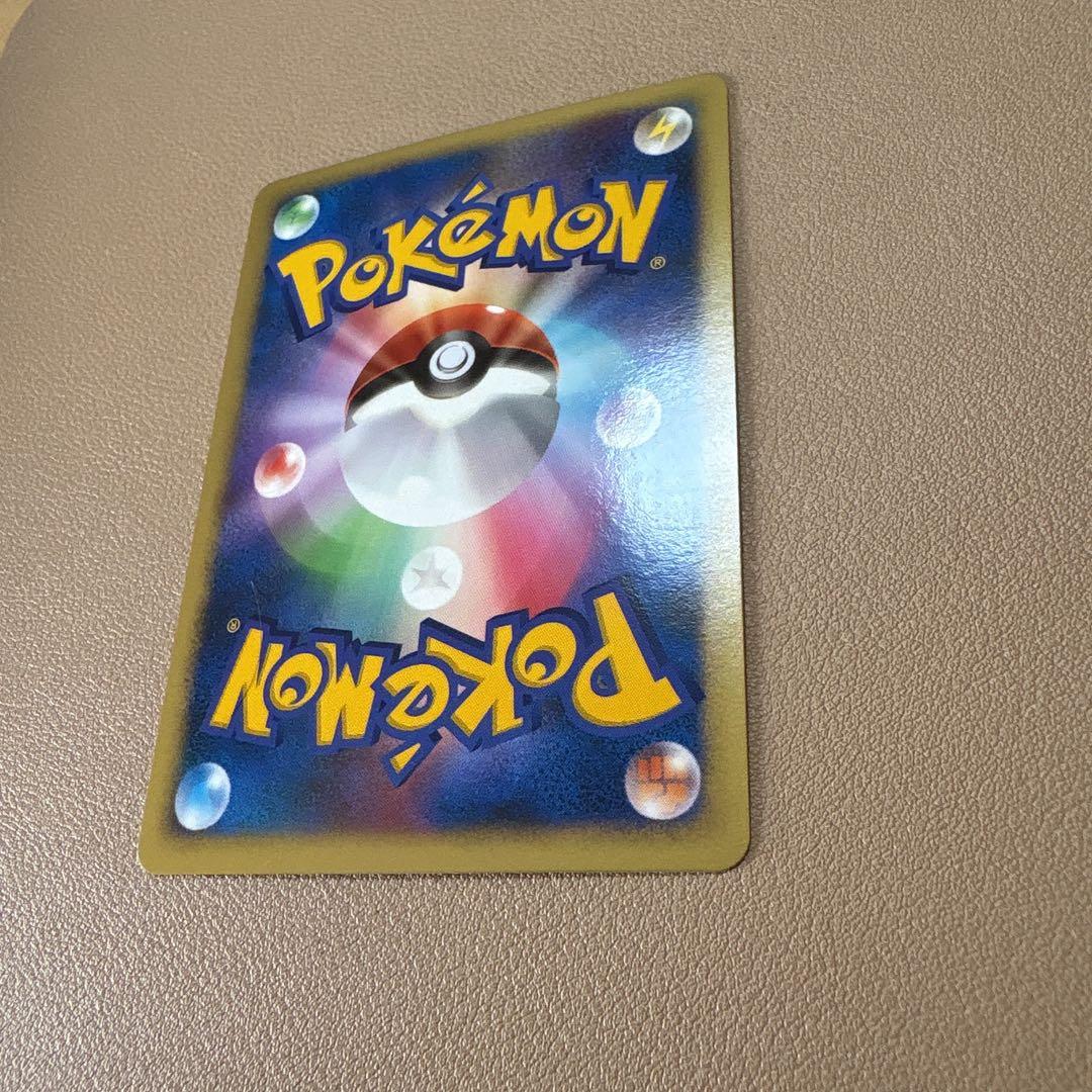 Bandai Pokémon 10th Anniversary 2007 holographic Lugia collectible card in protective sleeve