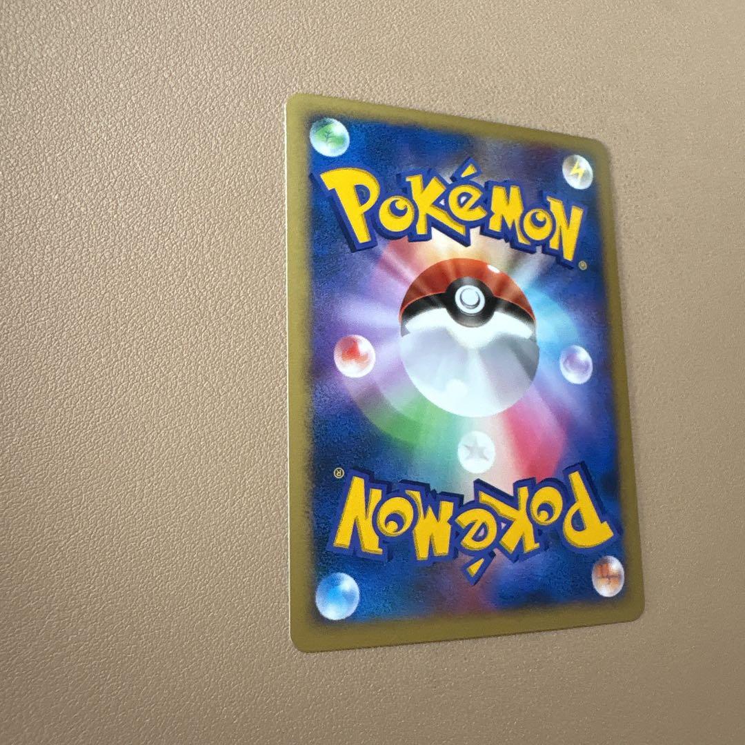 Bandai Pokémon 10th Anniversary 2007 holographic Lugia collectible card in protective sleeve