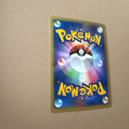 Bandai Pokémon 10th Anniversary 2007 holographic Lugia collectible card in protective sleeve
