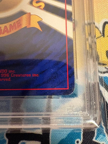 Sony PSA7 Pokémon Hakyu Ryu First Edition trading card with PSA Grade 7 certification in plastic case