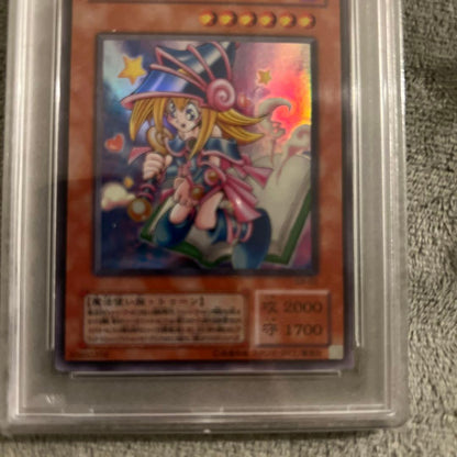 Ultra Rare Toon Dark Magician Girl Yu-Gi-Oh! trading card graded PSA 9 with Japanese text