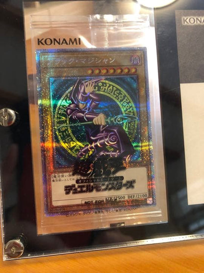 Yu-Gi-Oh Black Magician Prisma Secret Rare monster card with notification letter and screw-down holder