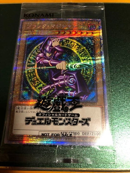Yu-Gi-Oh Black Magician Prisma Secret Rare monster card with notification letter and screw-down holder