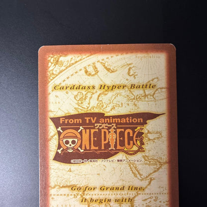 Bandai One Piece Buggy C24 Treasure Hyper Battle Japanese card with signs of aging in a rigid waterproof case