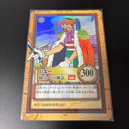 Bandai One Piece Buggy C24 Treasure Hyper Battle Japanese card with signs of aging in a rigid waterproof case