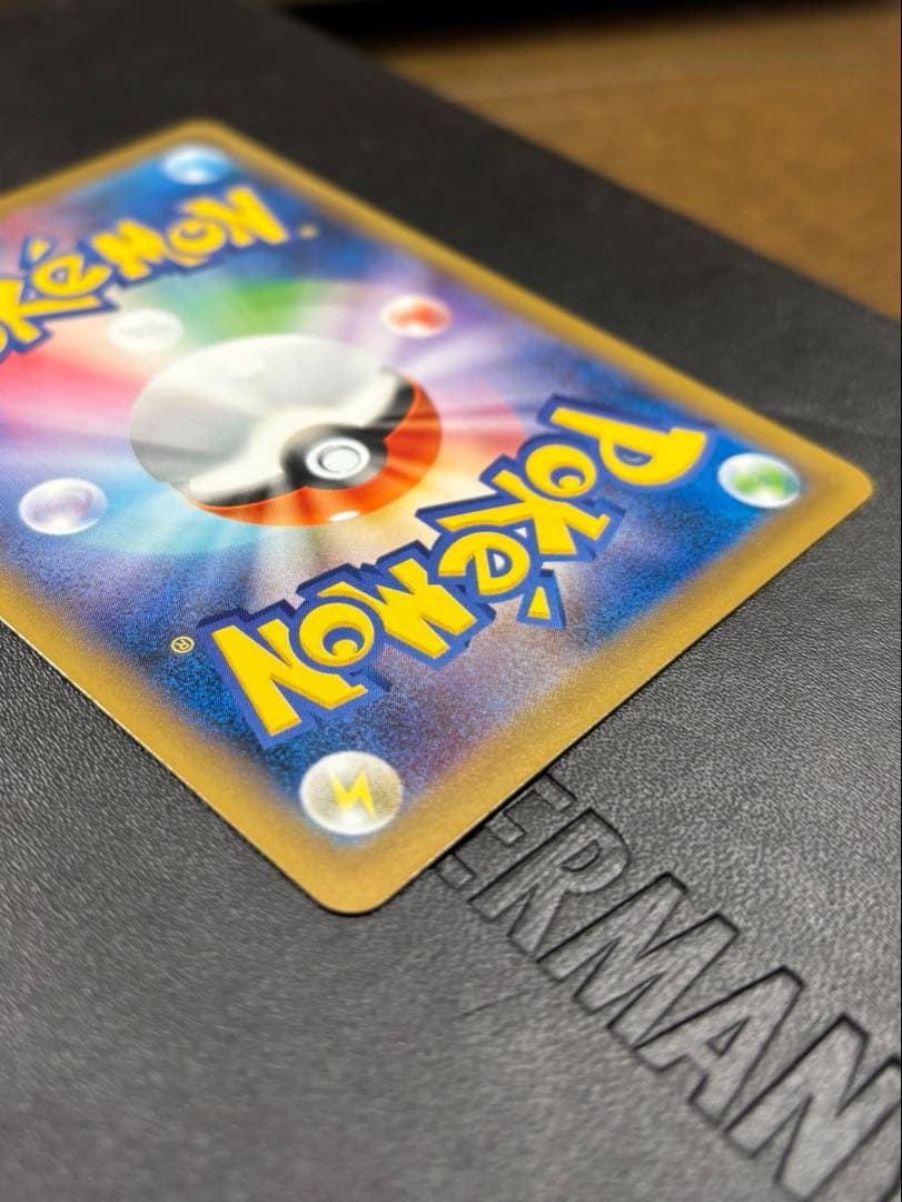Bandai XY Series Pikachu 20th Anniversary Promo Card in protective sleeve, mint condition collectible