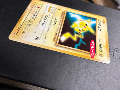 Bandai XY Series Pikachu 20th Anniversary Promo Card in protective sleeve, mint condition collectible