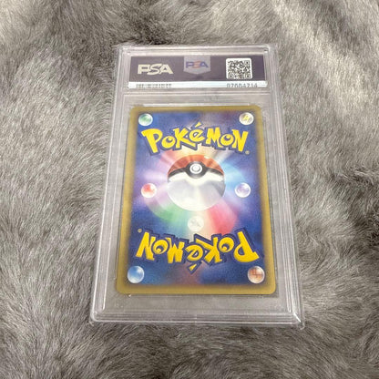 Delta Pikachu 1st Edition PSA10 Pokémon collectible card from Japan with visible wear and vintage condition