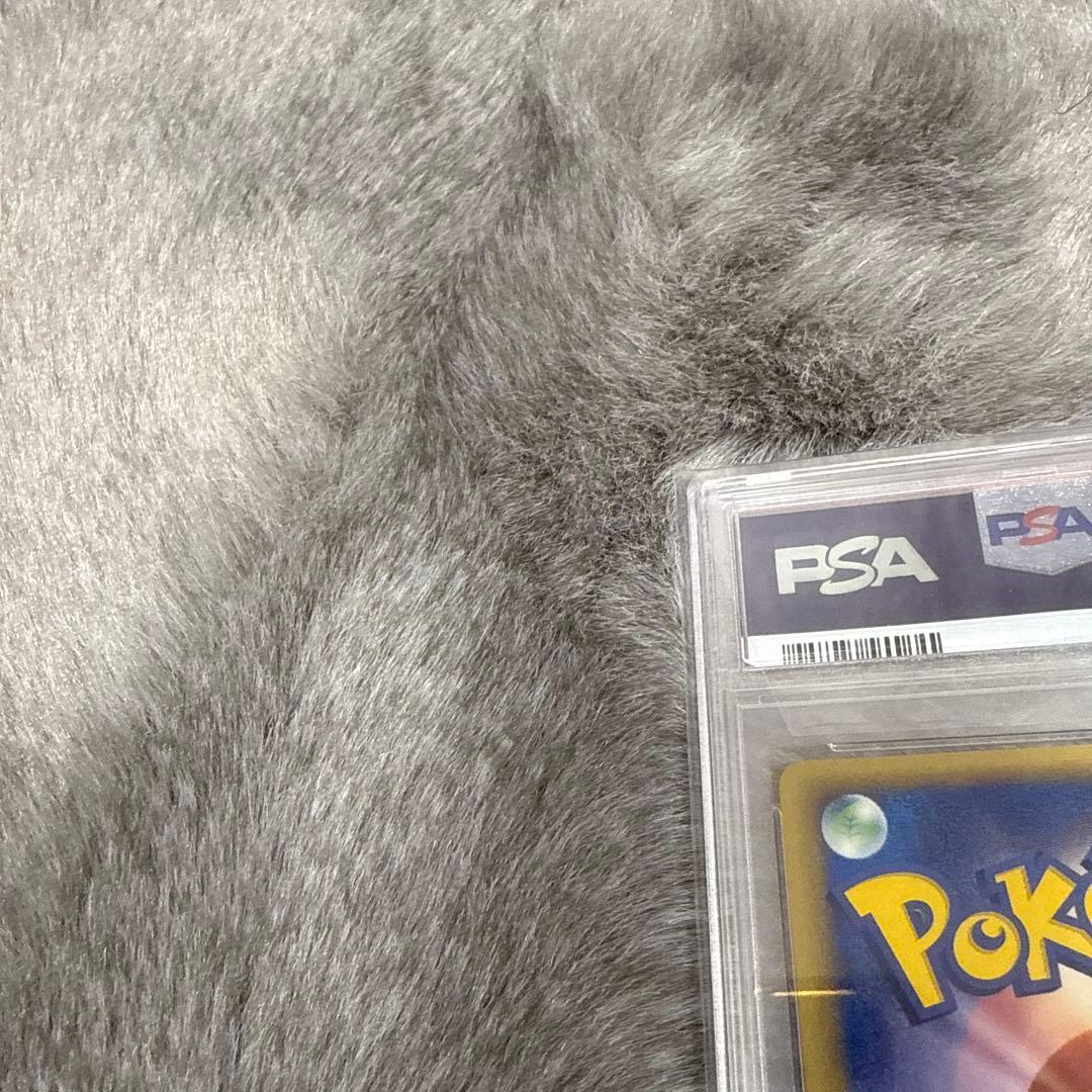 Delta Pikachu 1st Edition PSA10 Pokémon collectible card from Japan with visible wear and vintage condition
