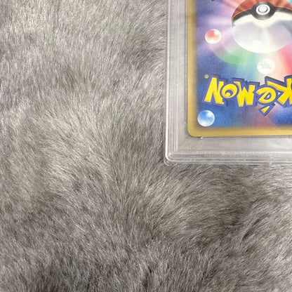 Delta Pikachu 1st Edition PSA10 Pokémon collectible card from Japan with visible wear and vintage condition