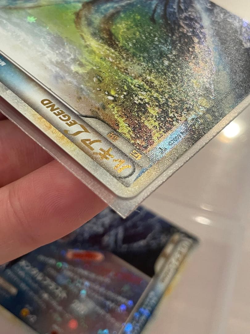 Lugia Legend first edition holographic Japanese trading card from Soul Silver collection with minor imperfections