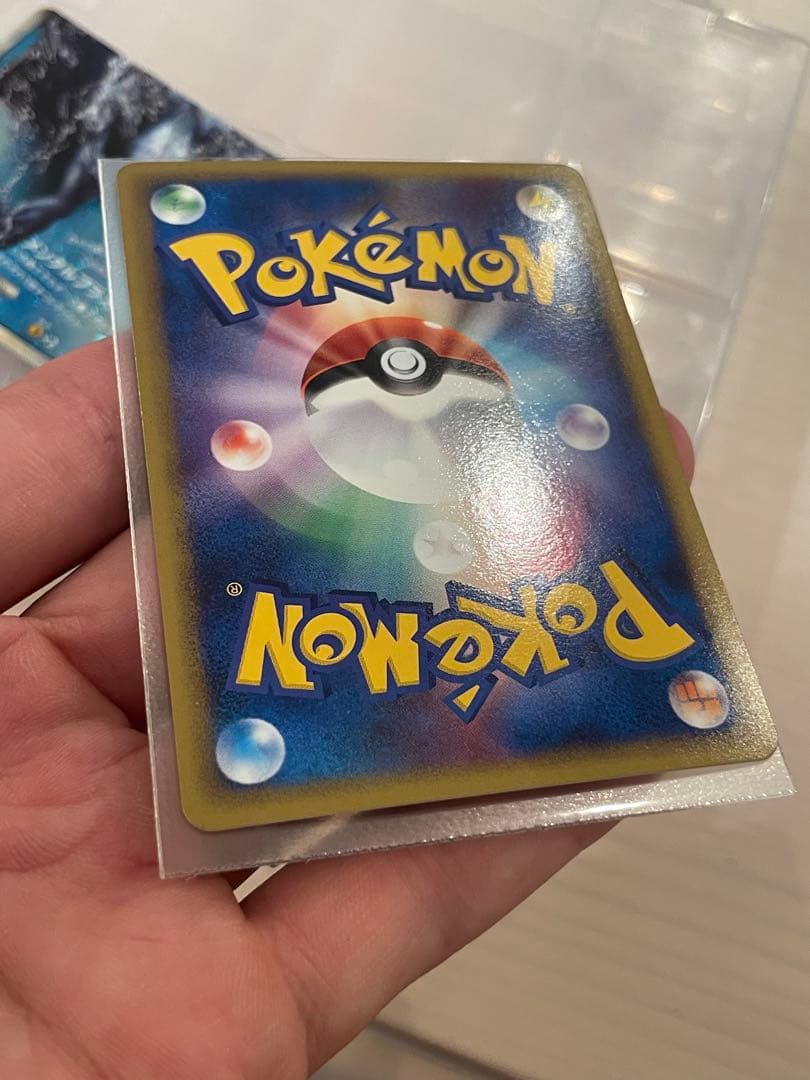 Lugia Legend first edition holographic Japanese trading card from Soul Silver collection with minor imperfections