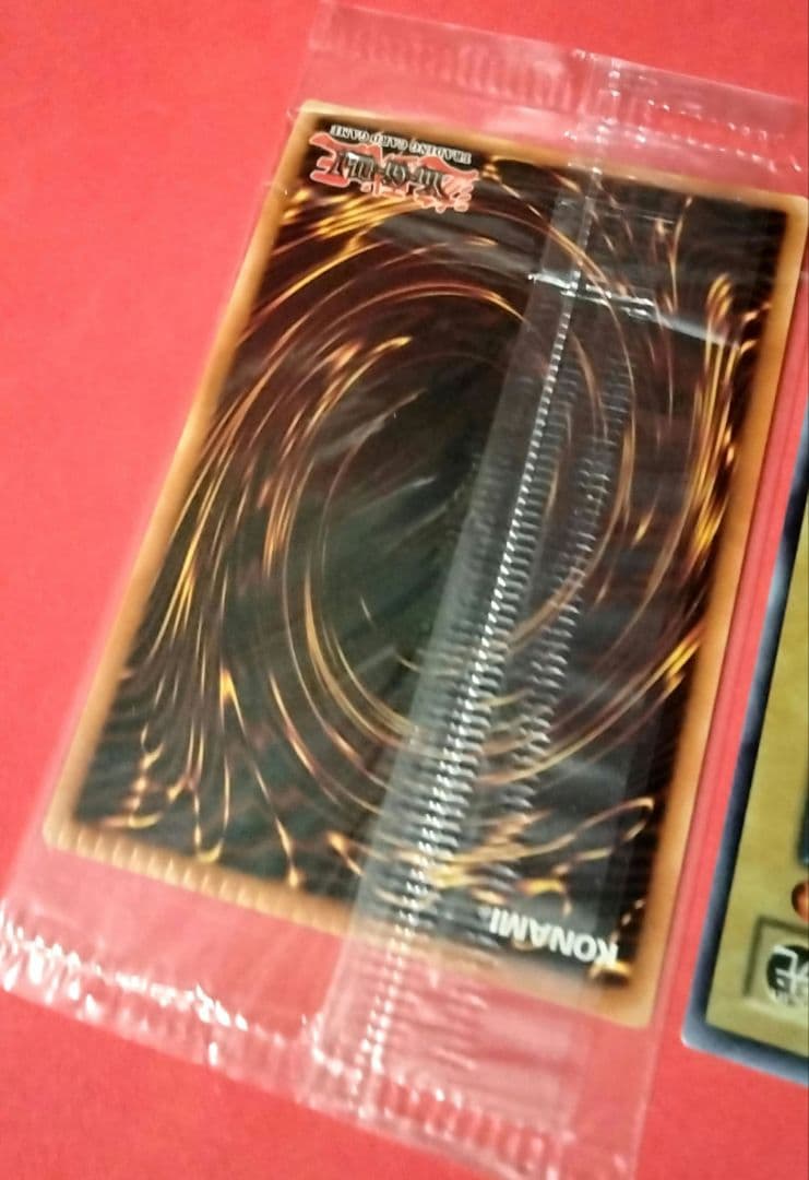 Blue-Eyes White Dragon Ultra Rare 2-card set with top-left crack error in sealed original packaging