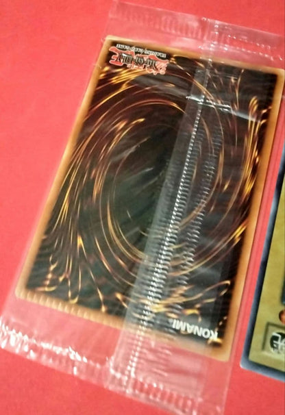 Blue-Eyes White Dragon Ultra Rare 2-card set with top-left crack error in sealed original packaging