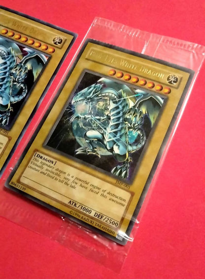 Blue-Eyes White Dragon Ultra Rare 2-card set with top-left crack error in sealed original packaging