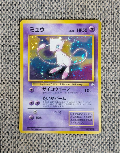 Used vintage Mew Fossil Secrets expansion pack old card from Japan showing signs of age with no major damage