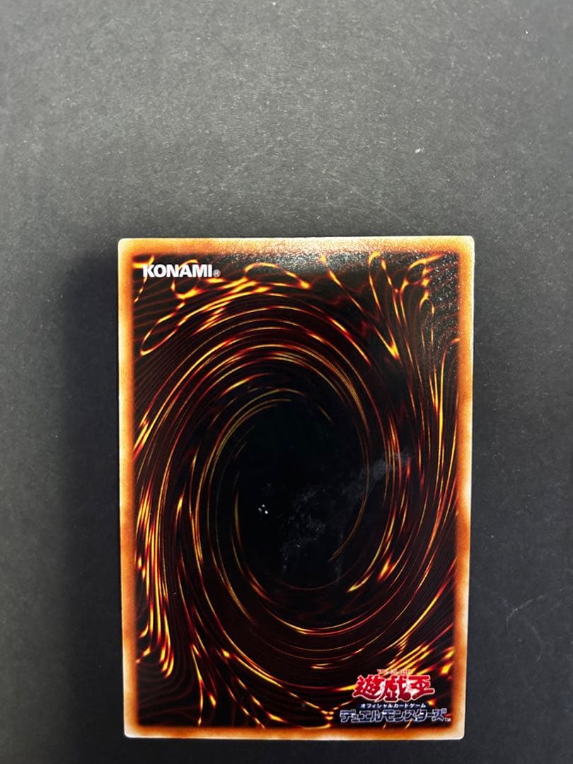 Blue-Eyes White Dragon Ultra Rare Yu-Gi-Oh! OCG card from starter box with visible wear