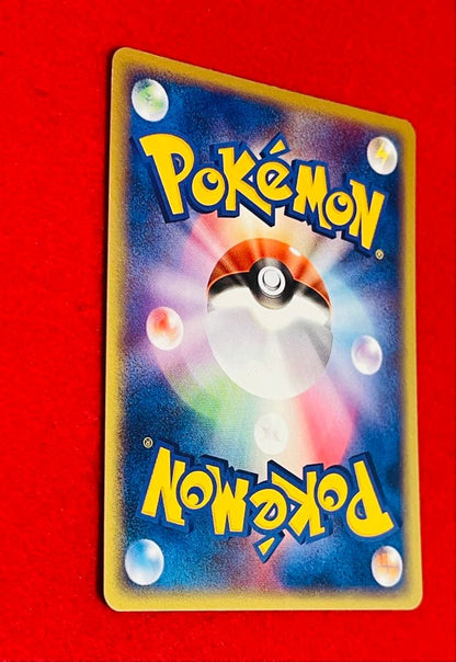 Seven Eleven Limited Promo Nyasu 028/ADV-P Pokemon card in sleeve and side loader with bonus plastic bag