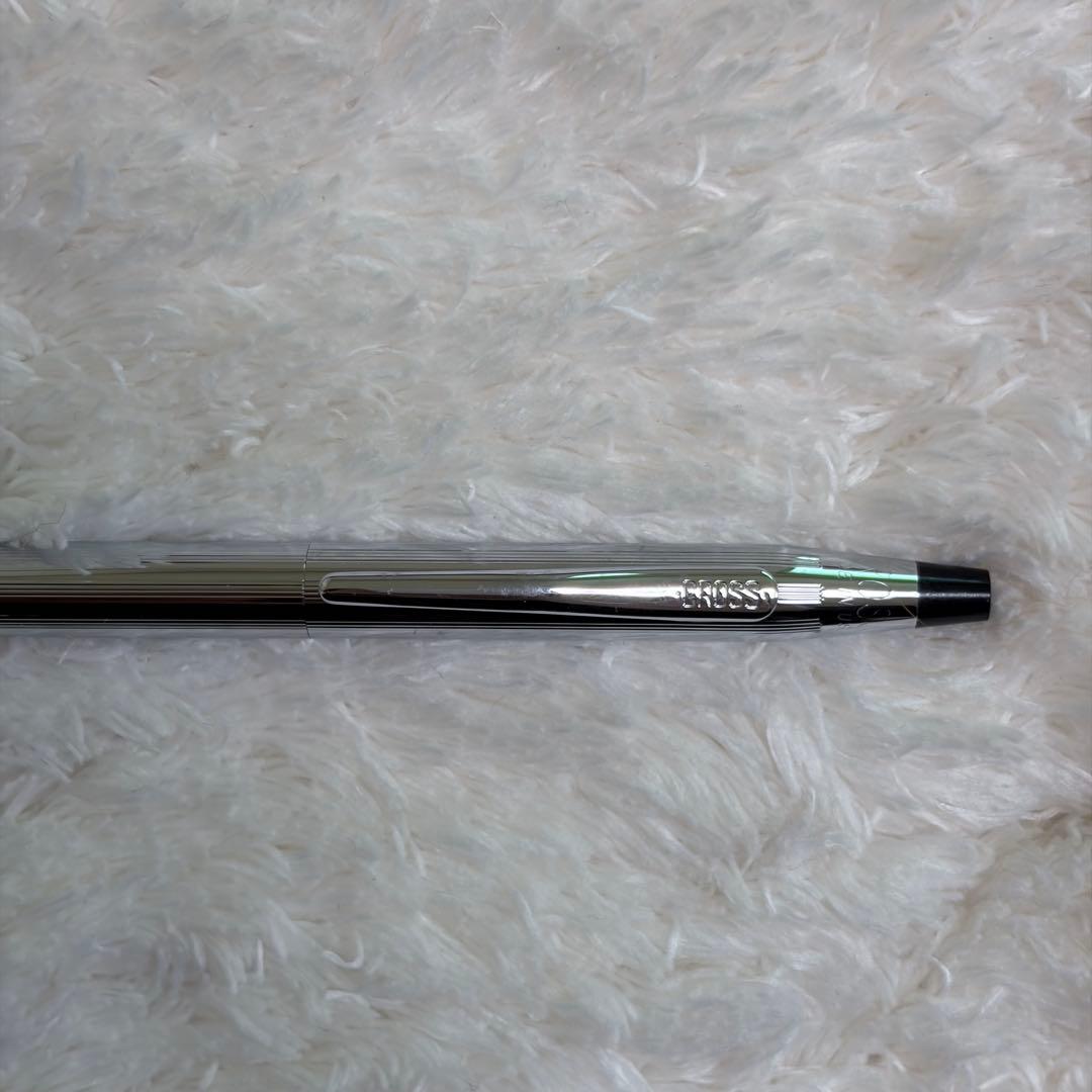 CROSS gold ballpoint pen with gold body and included box showing signs of storage wear
