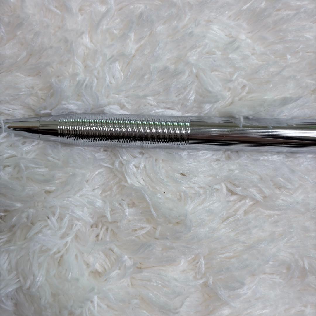 CROSS gold ballpoint pen with gold body and included box showing signs of storage wear