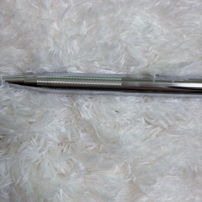 CROSS gold ballpoint pen with gold body and included box showing signs of storage wear