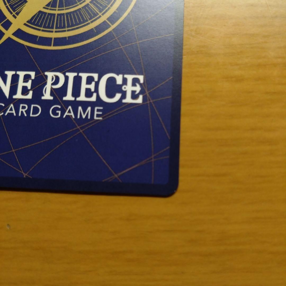One Piece Monkey D. Luffy Jump collectible card showing white scratches and signs of wear