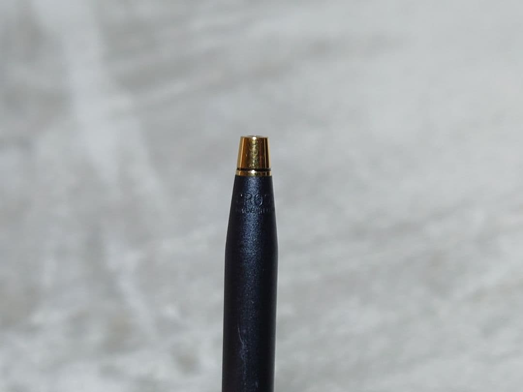 Cross Classic Century ballpoint pen in matte black with gold decoration and conical cap design