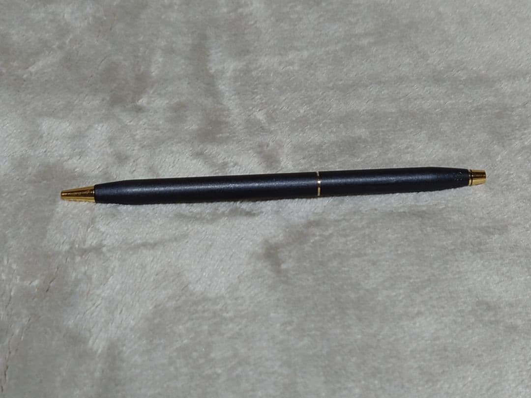 Cross Classic Century ballpoint pen in matte black with gold decoration and conical cap design